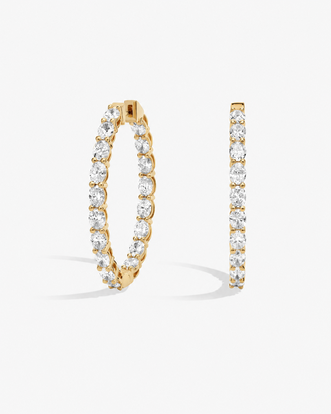 Oval diamond hoop earrings in gold #Gold